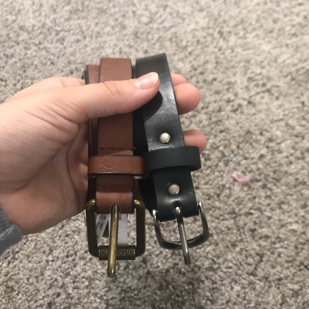 A two pack of belts. One black and one brown belt.